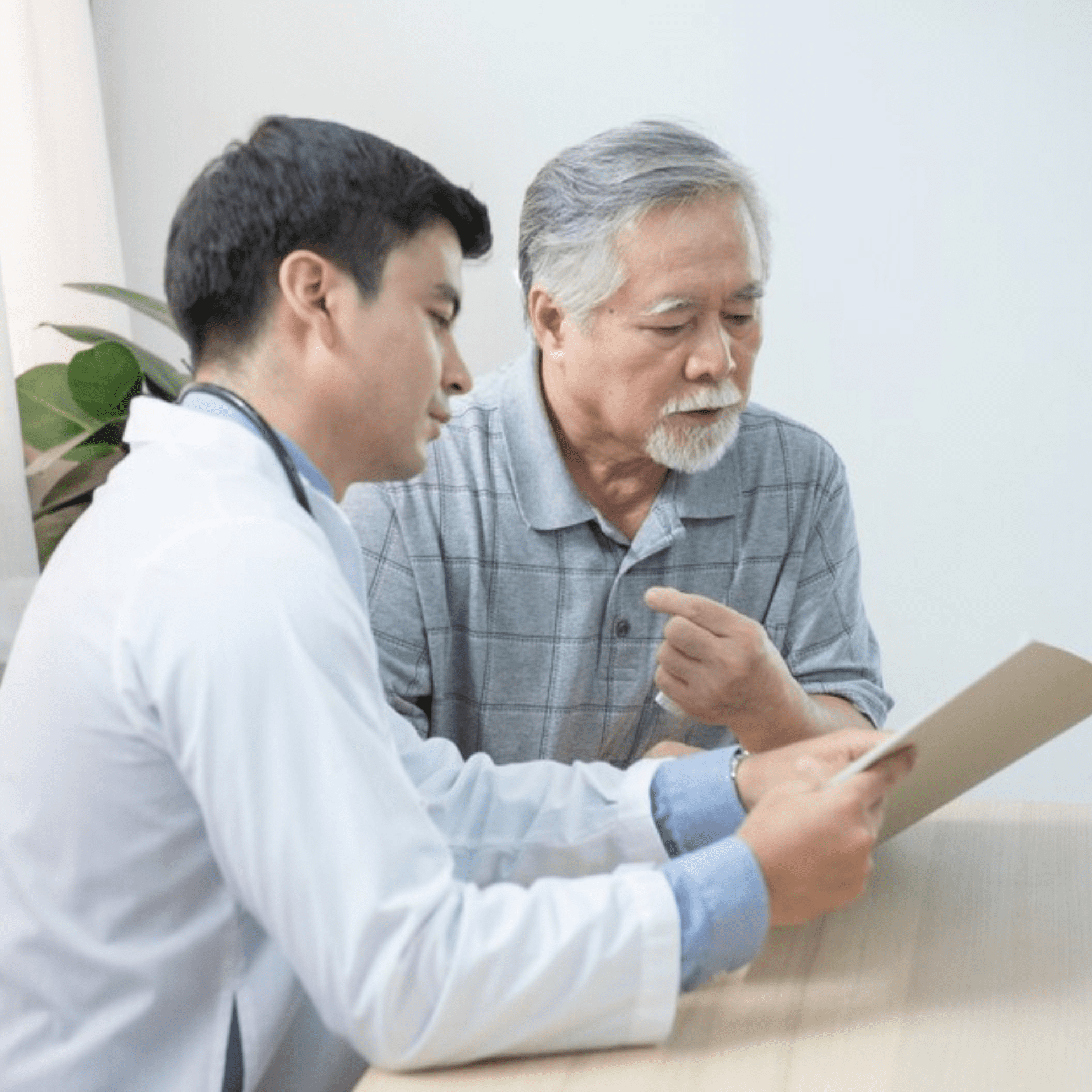 Doctor explain test result for elder man patient